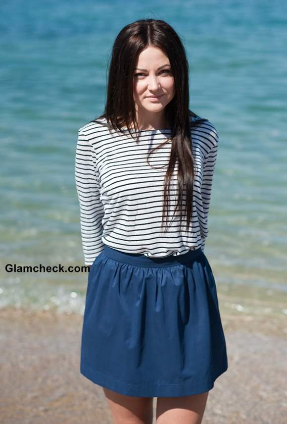 Wearing striped top with short skirt