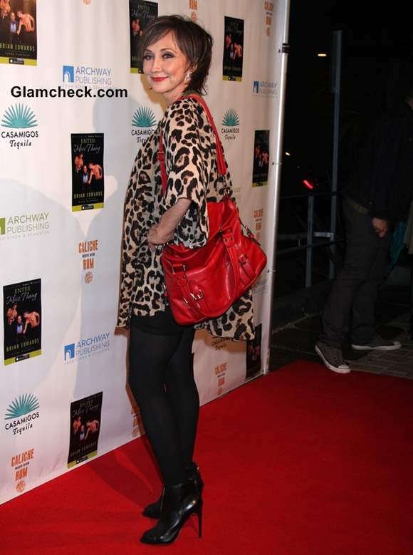 Pam Tillis Sports Leopard Print KaftanTop 2013