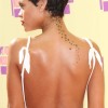 Rihanna Trailing Stars Neck and Back Tattoo