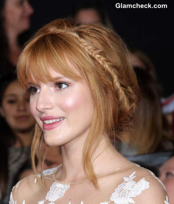 Bella Thorne At The Hunger Games In A Girly Bun And Braid