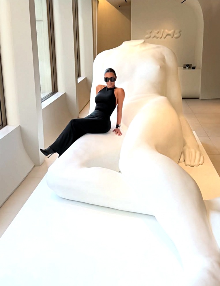 Kim Kardashian in black dress skims chicago store