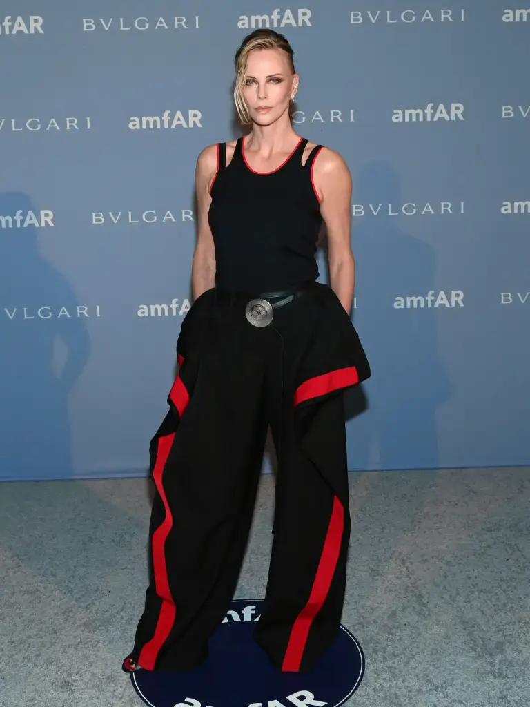 Charlize Theron wearing a Givenchy ensemble by Sarah Burton at amfAR Dallas 2026