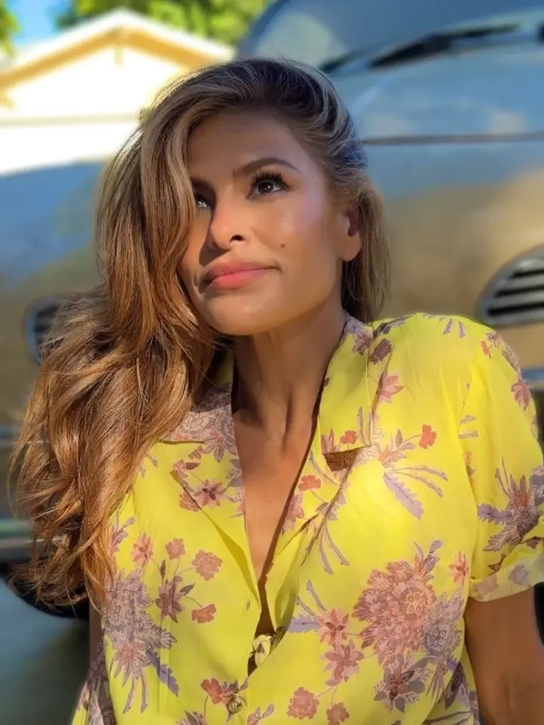 Eva Mendes giving the camera a playful, thoughtful glance
