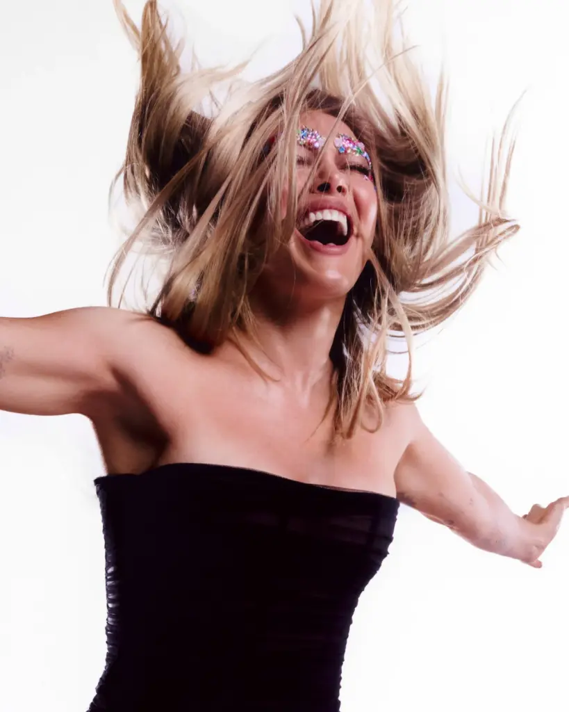 Hilary Duff in a cover story discussing her first live performance of What Dreams Are Made Of