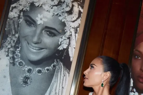 Kim Kardashian tries on Elizabeth Taylor’s Bulgari emerald necklace for her 46th birthday.