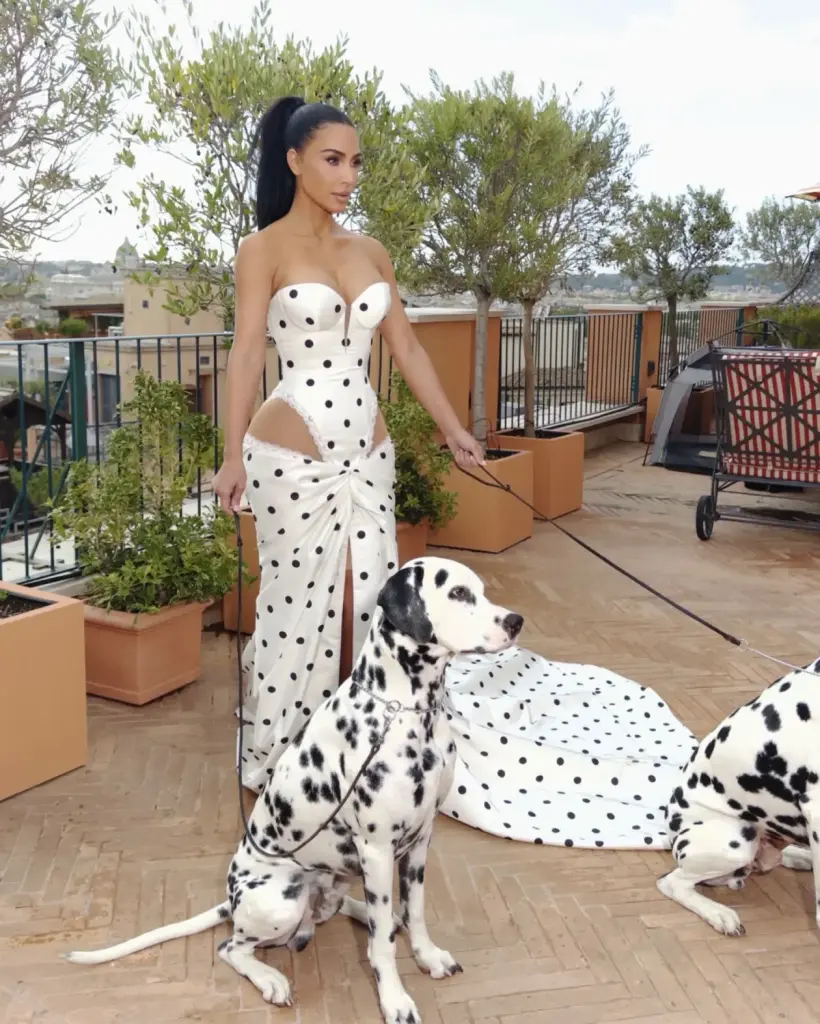 Kim Kardashian with a sleek high ponytail, defined eyes and nude-toned makeup