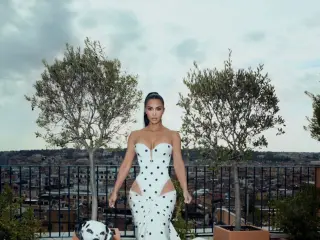 Kim Kardashian in a black-and-white Galia Lahav polka-dot gown while promoting All’s Fair in Rome