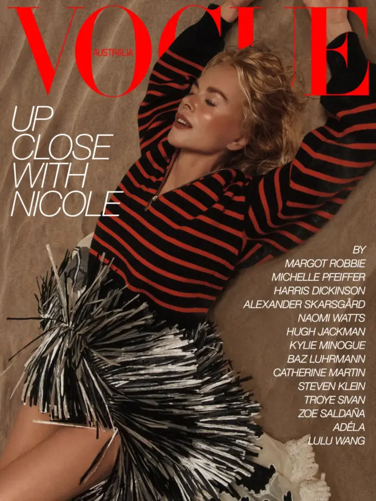 Nicole Kidman in a red-and-black Chanel sweater and black-and-white fringed skirt