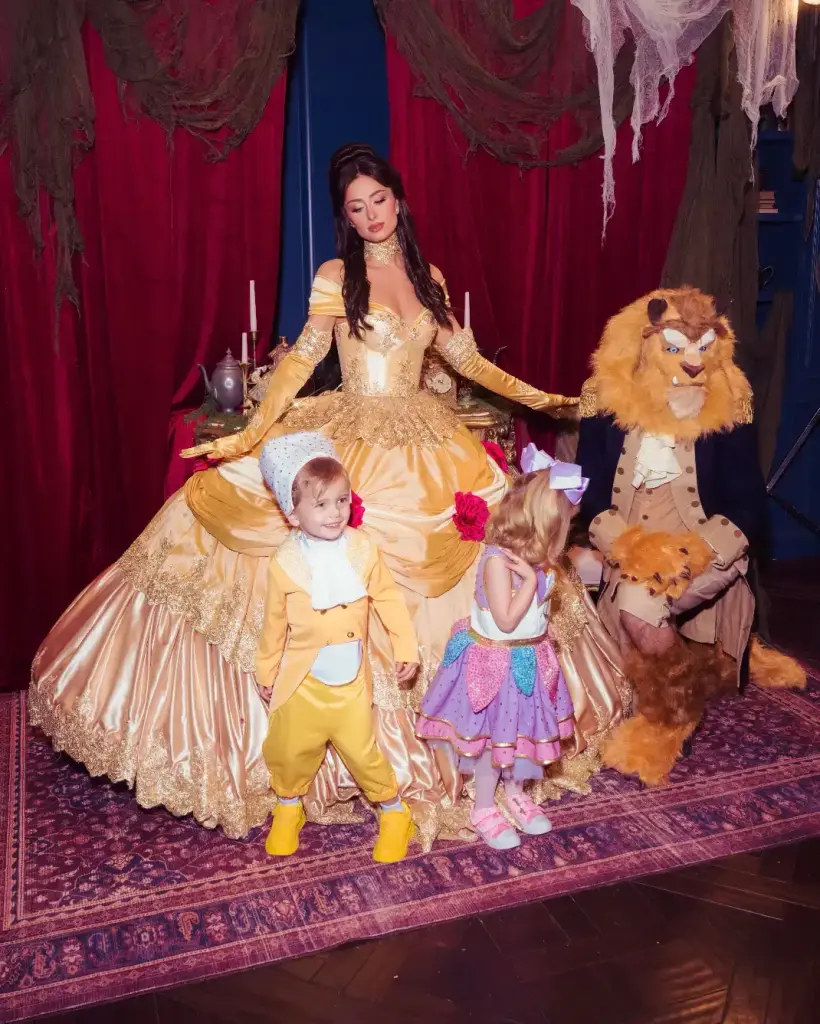 Paris Hilton's family dressed as Belle, the Beast, Lumière and Chip