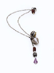 A Bajoran style earring with a chain to an ear cuff
