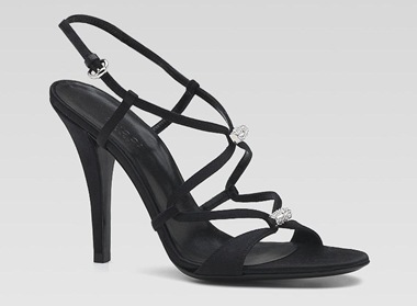 Strappy high-heeled sandals with a tall slim heel and open construction