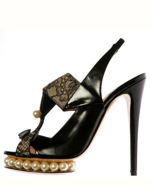 Sculptural embellished shoes with intricate applied patterning