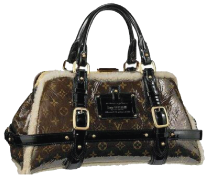 A selection of designer handbags from several brands