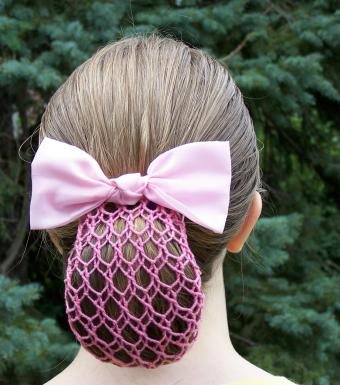 A decorated snood gathering hair at the nape