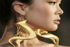 Large heavy ornate earrings